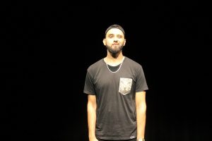 Production photo of spoken word artist Zohab for Boys will be boys.